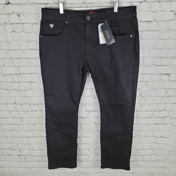 GUESS | Vermont slim fit low rise tapered leg jeans - Picture 4 of 9